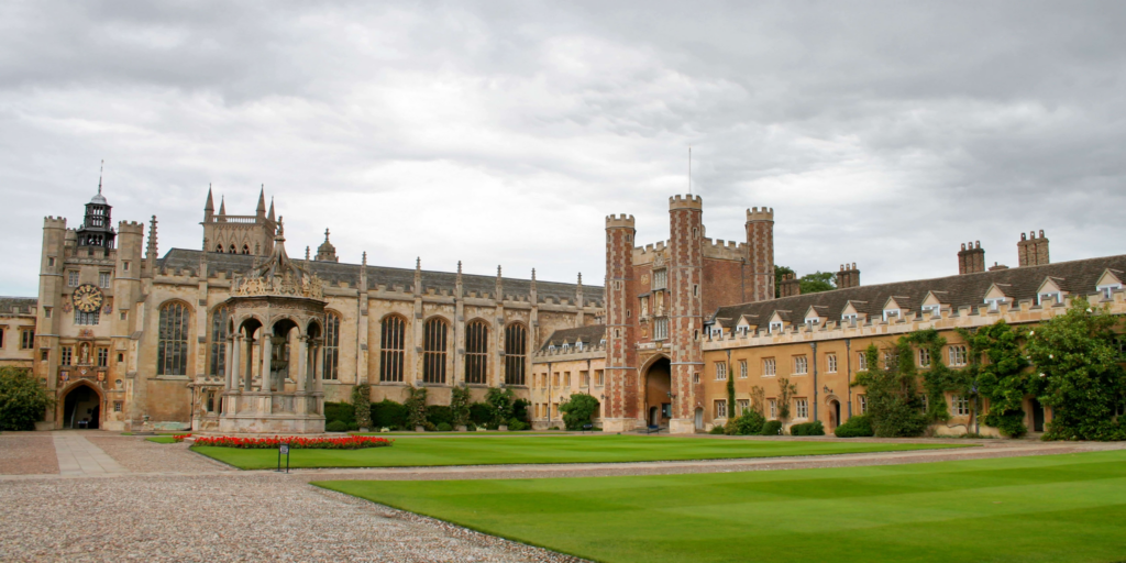 A panoramic view of the historic buildings and lawns of Cambridge University.