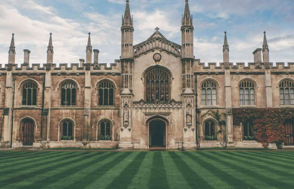 Aerial view of the historic buildings and courtyards of Cambridge University.