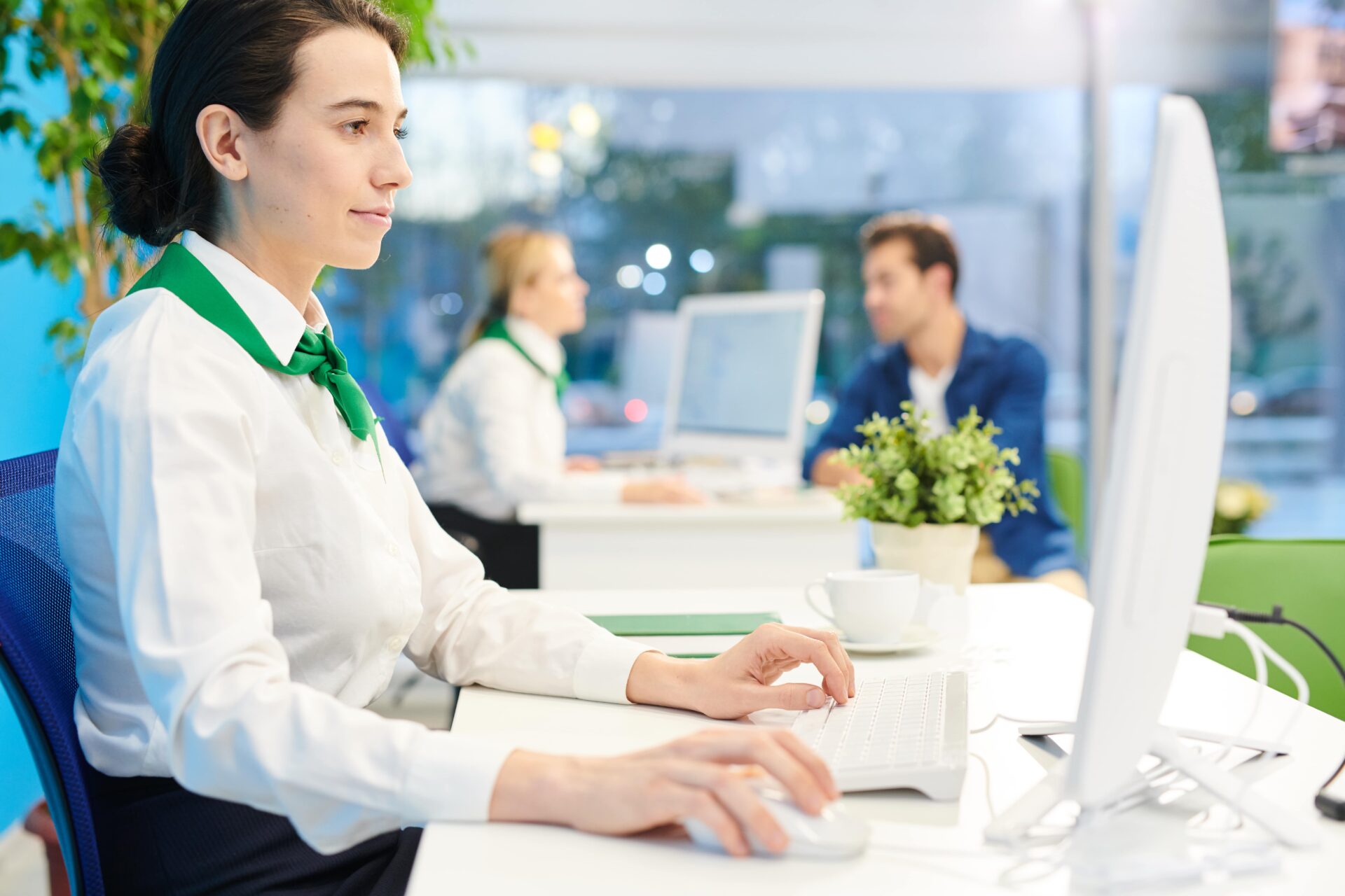 female banker working with desktop