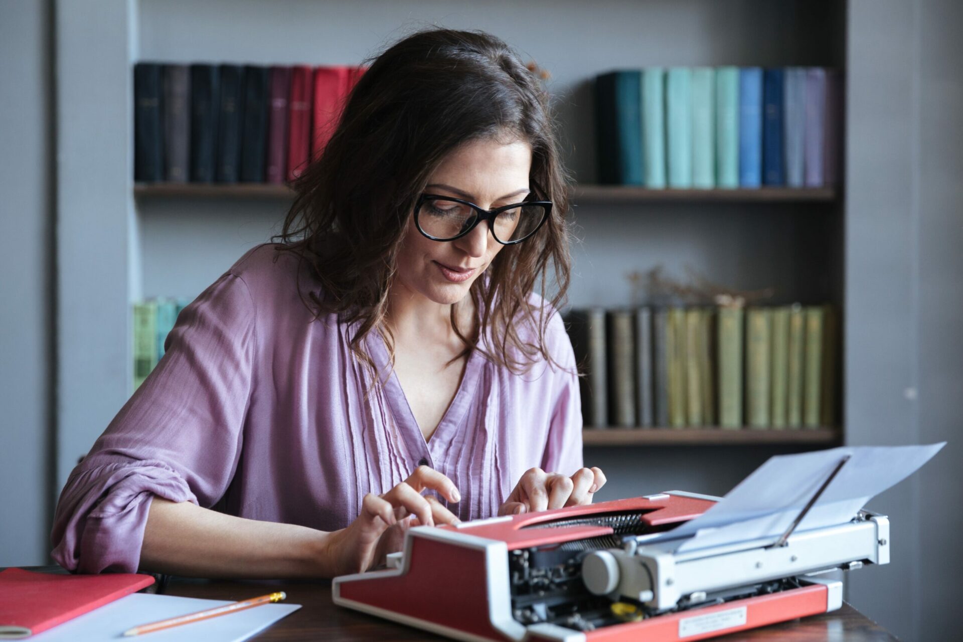 Female journalist with typewriter