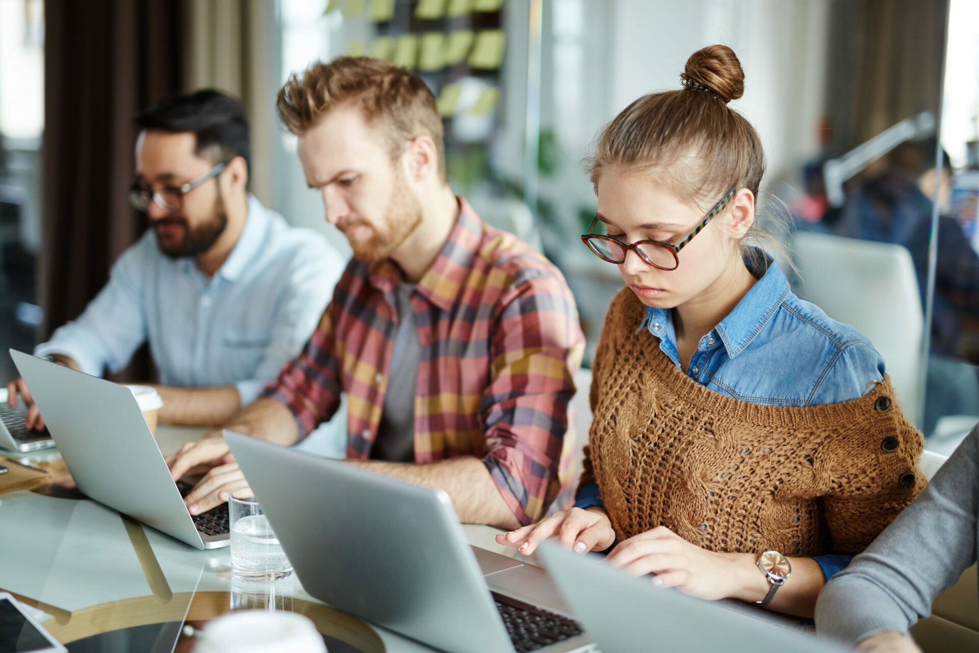 college students facing laptop