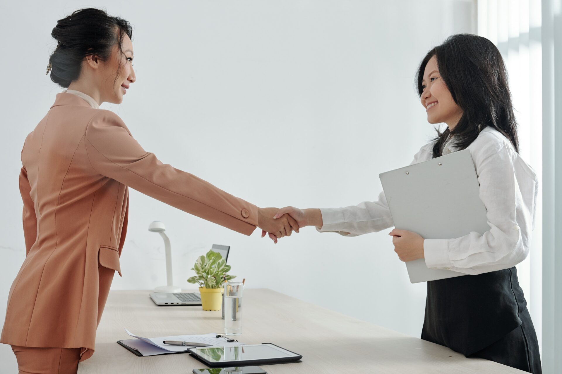 Human Resource manager handshake employee
