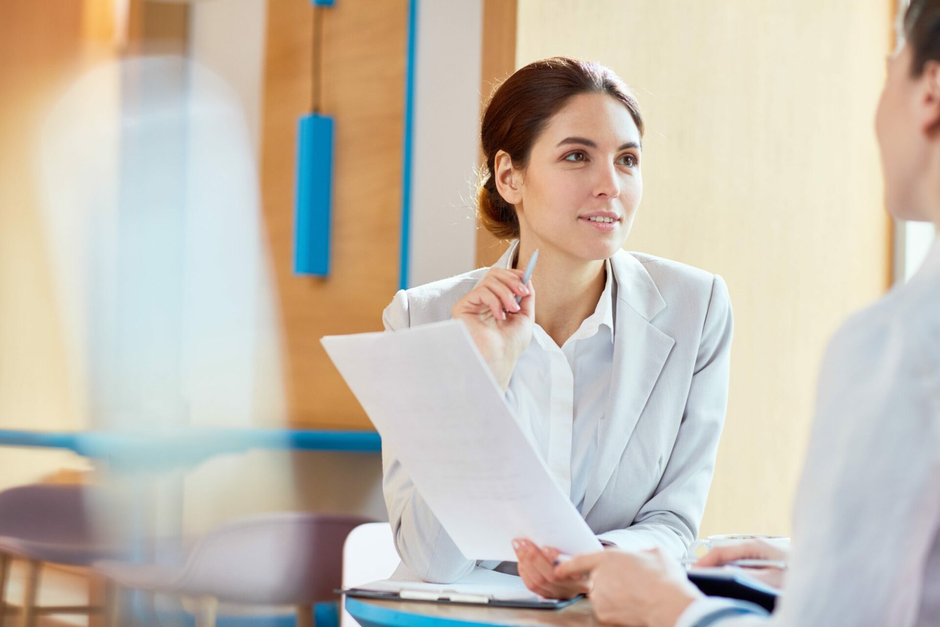 Female talking to client