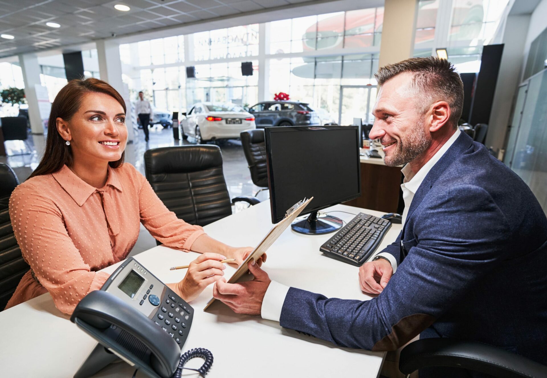 Woman talking to manager at work