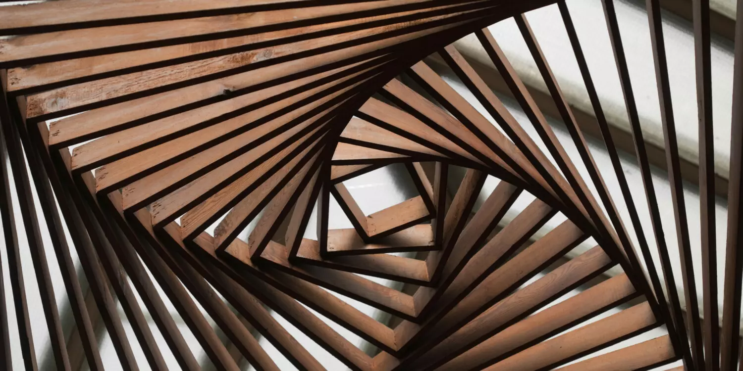 a wooden structure with a spiral pattern