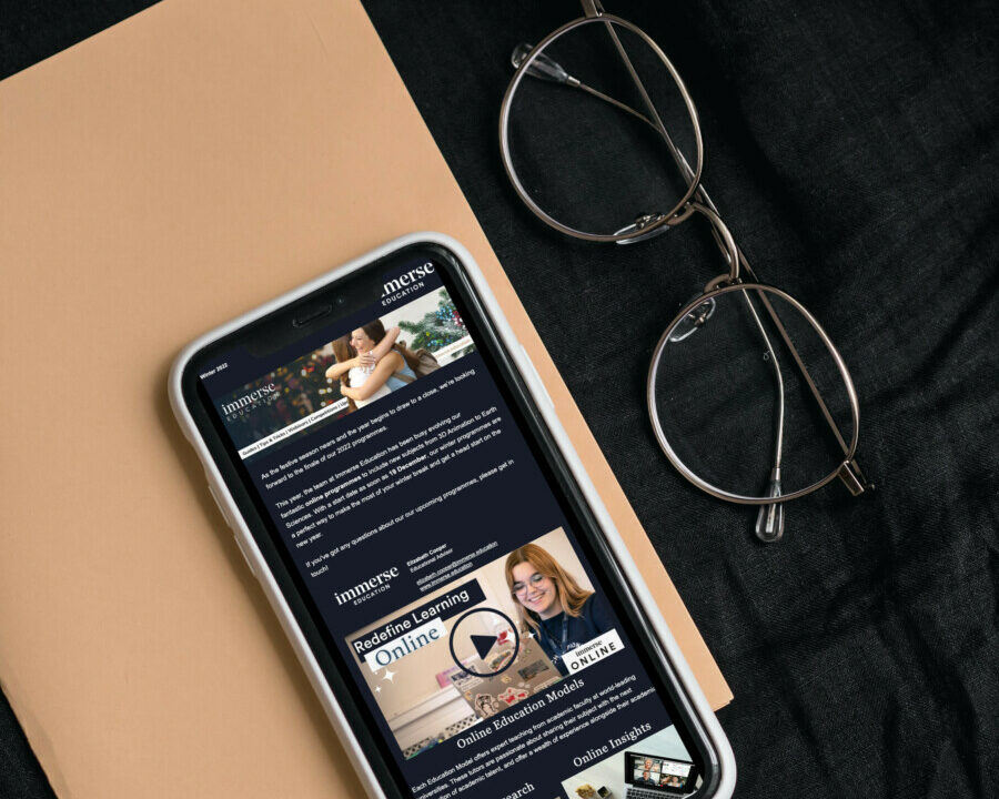 Immerse Education website opened on a phone.