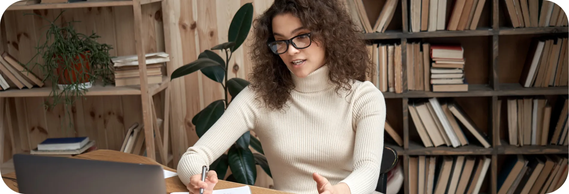 A woman discussing on her laptop