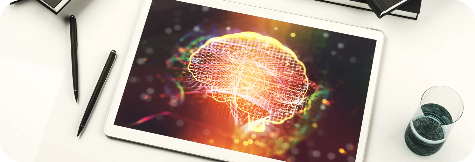 a tablet with a picture of a brain