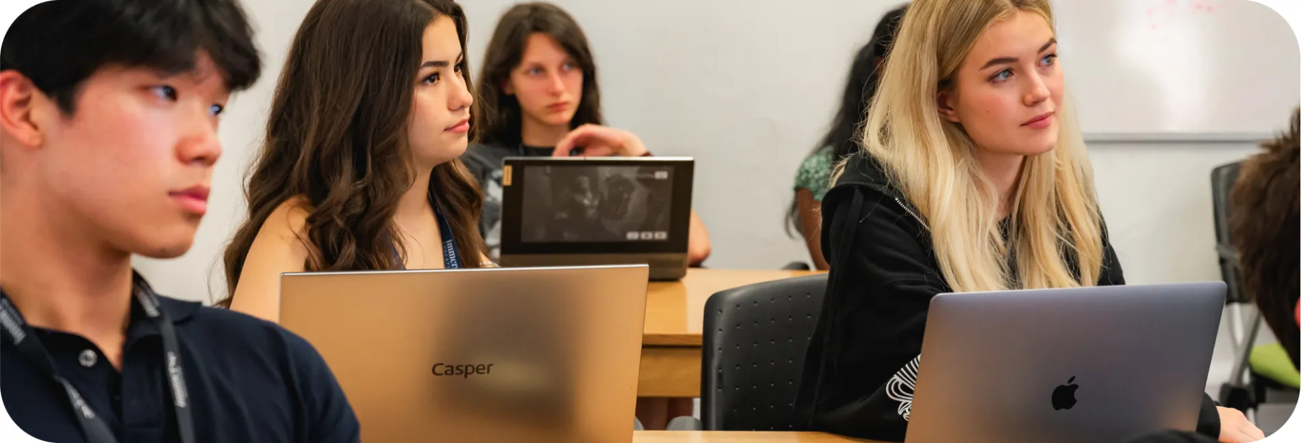 a group of students listening on discussion