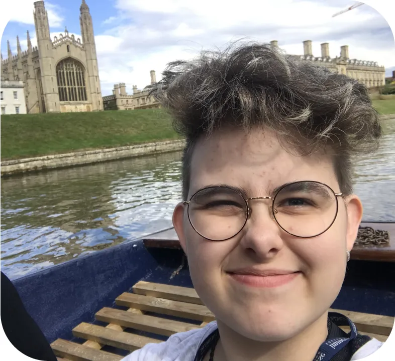 Atlas D. in a boat taking a selfie