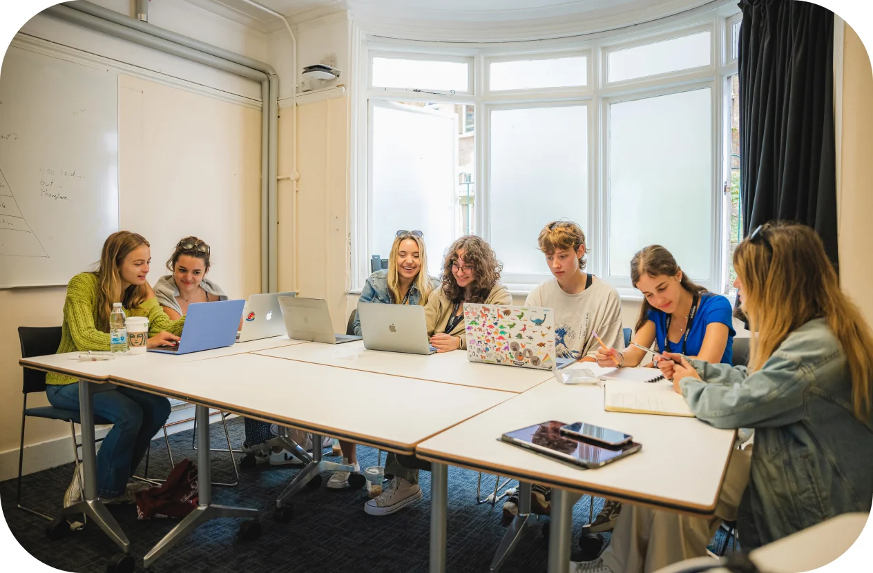 Group of women collaborating on their works