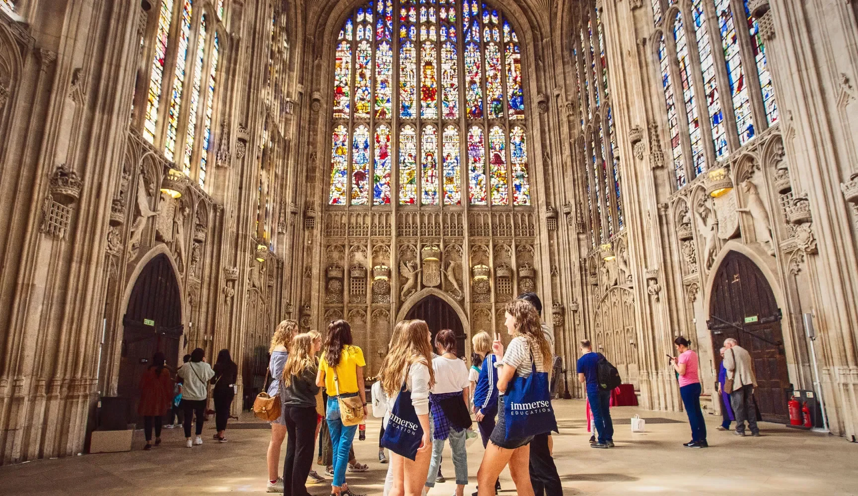 a group of people in a King's College Chapel