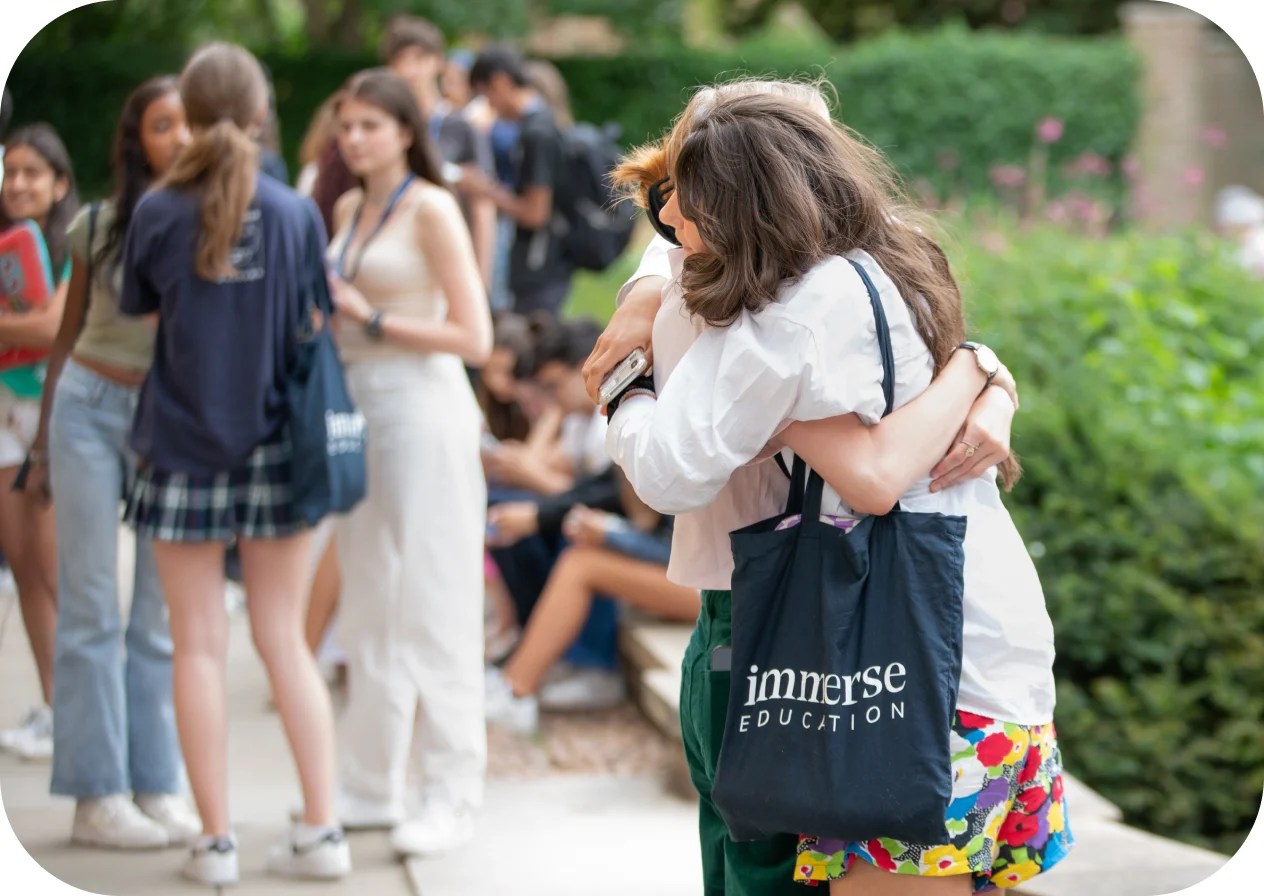 Two female hugging each other