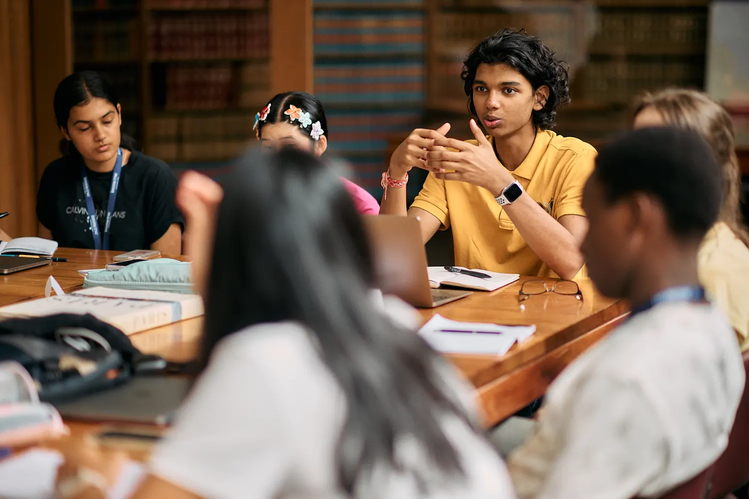 Students attentively participating in a medicine class at Immerse Education.