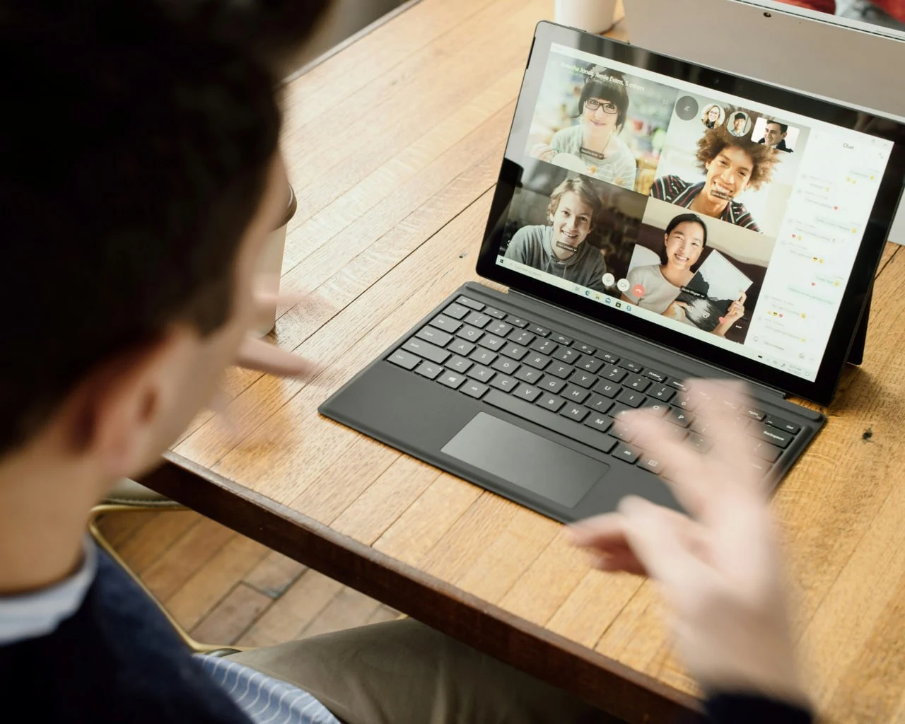 Students in an online group meeting