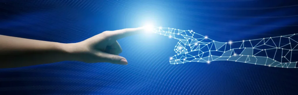 Human hand touching AI hand