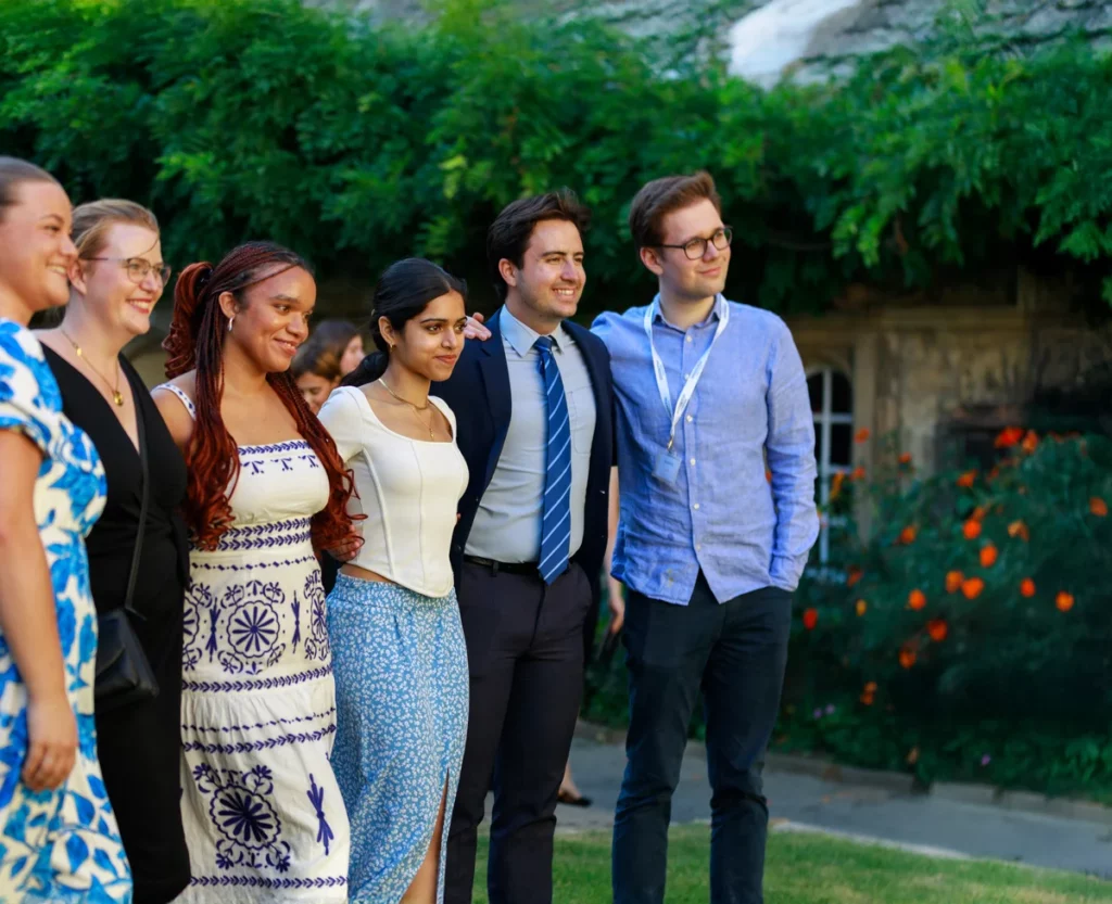students pose at the end of a pre college program in cambridge
