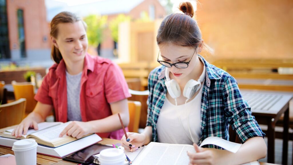 Two teens studying in one of the best study spots in Melbourne
