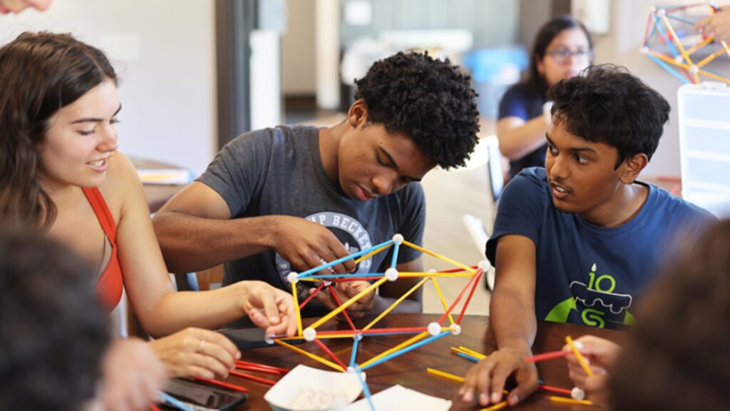 A group of students working together on a mathematical model