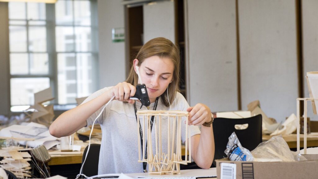 A student working on the model of something