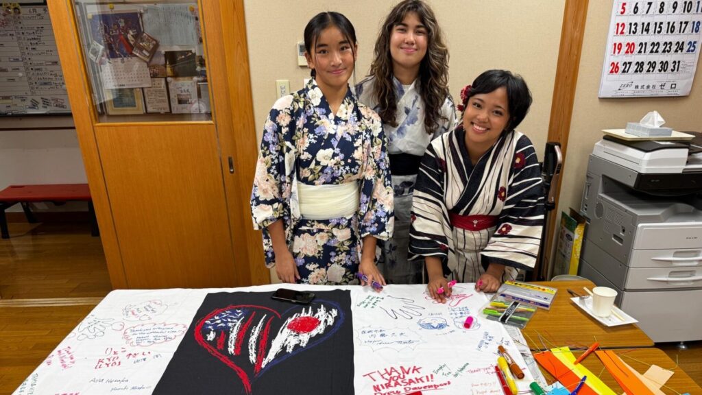 Students posing with a project they made